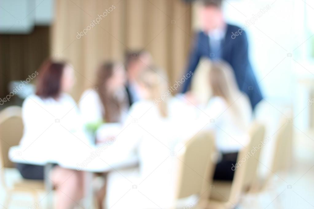 Blur background : Business People Having Board Meeting In Modern Office
