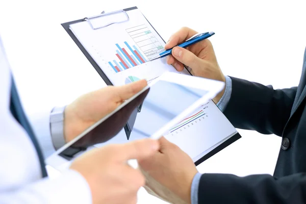 Business colleagues working and analyzing financial figures on a digital tablet — Stock Photo, Image