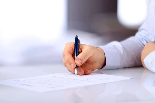 Businessman is signing a contract, business contract details Royalty Free Stock Photos