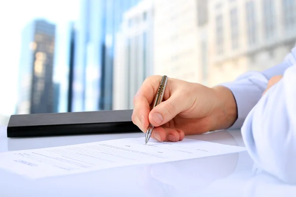 Businessman is signing a contract, business contract details — Stock Photo, Image