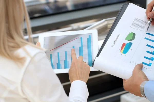 Image of business partners discussing documents  in the office — Stock Photo, Image