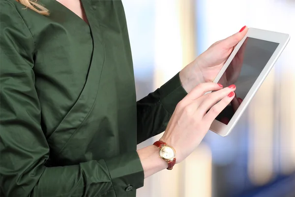 Busineswoman holding  and working with a digital tablet — Stock Photo, Image