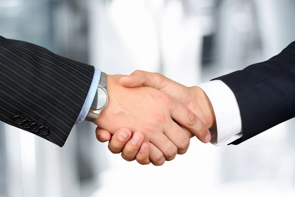 Close-up image of a firm handshake  between two colleagues outsi — Stock Photo, Image