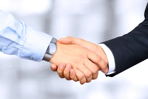 Close-up image of a firm handshake  between two colleagues — Stock Photo, Image