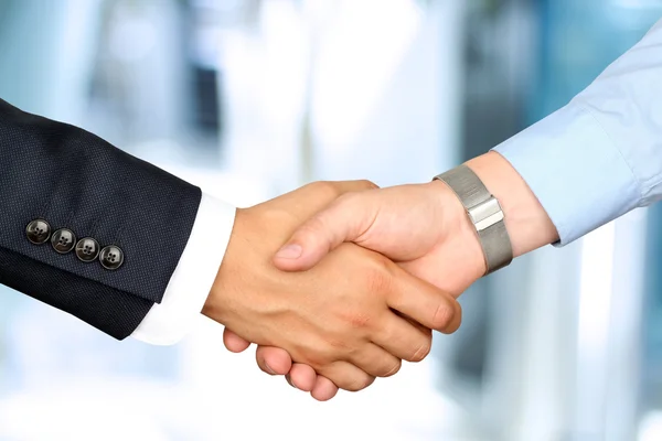 Close-up image of a firm handshake  between two colleagues — Stock Photo, Image