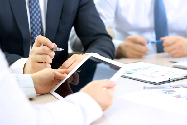 Close-up image of a firm handshake between two colleagues in office — Stock Photo, Image