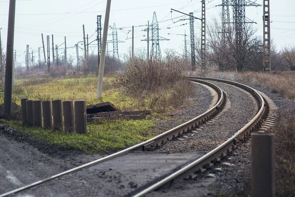 Railway tracks, rails, sleepers, train track. Railway track. Steel sleepers, curved shape. Turn by rail