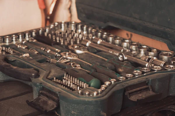 Workshop scene. Tools on the table and board. Garage, car shop. Special vehicle repair tool — Stock Photo, Image