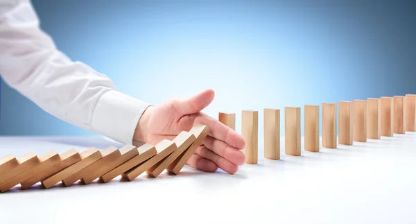 Problem Solving - Hand Stopping Domino Effect — Stock Photo, Image