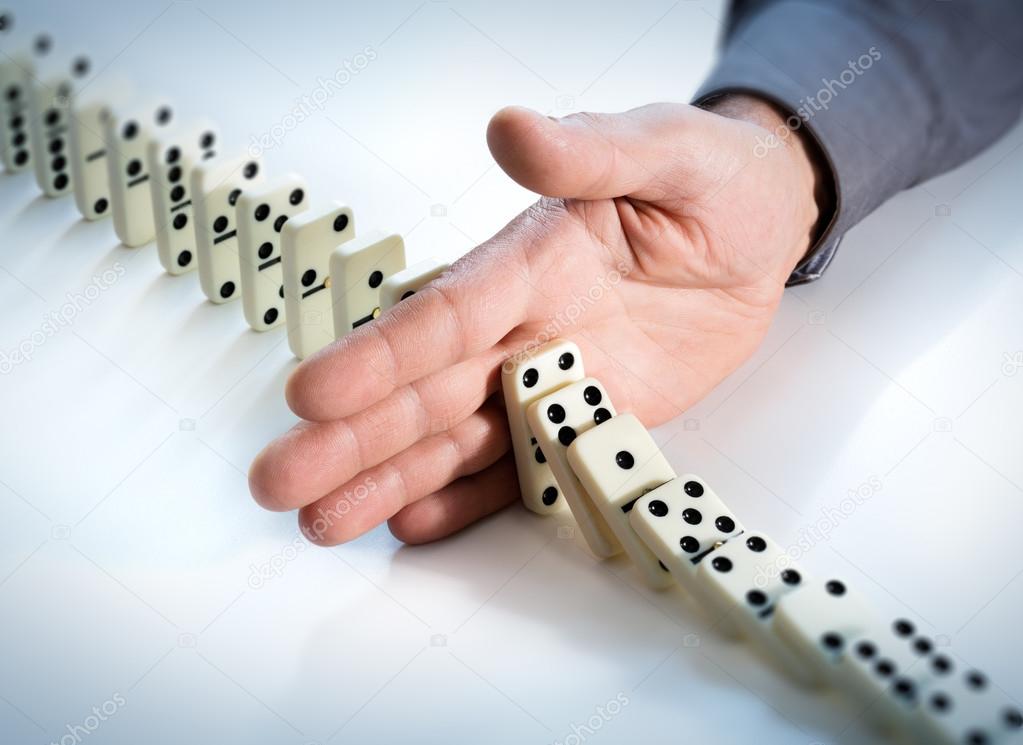 Stop Domino Effect - Hand Prevents Failure