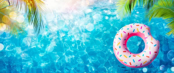 Inflatable Donut Pool Palm Leaves Sunlight — Stock Photo, Image