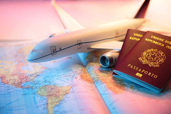 Trip in America - passport, airplane and map of world