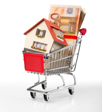 House in shopping-cart with euro bills clipart