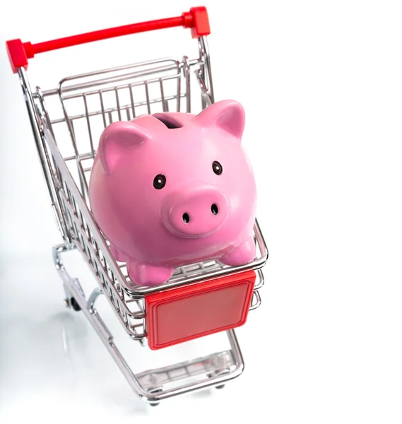 Saving concept - piggy bank in cart — Stock Photo, Image