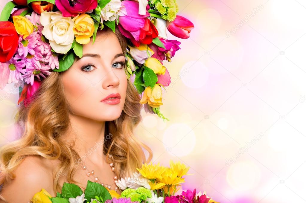 Spring woman beauty portrait with flowers hairstyle