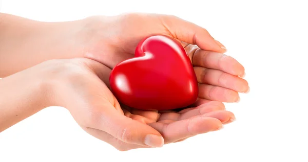 Woman hands giving heart - love and sharing concept — Stock Photo, Image