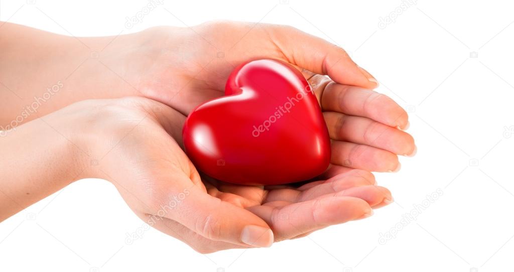 Woman hands giving heart - love and sharing concept