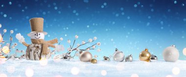 Kardan adam karda Baubles ile