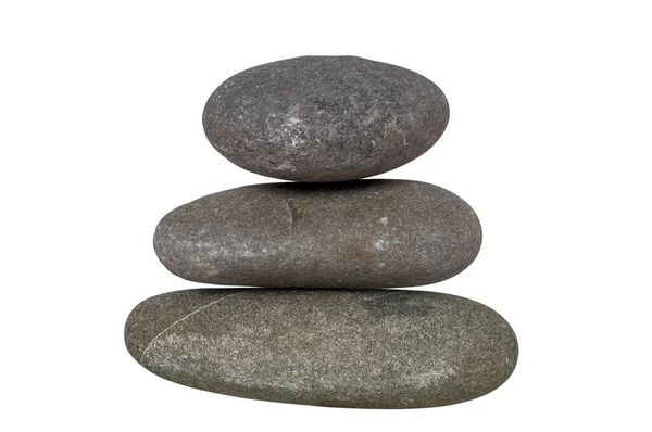 Taşlar gri, izole edilmiş, kolajlarda kullanmak için çeşitli kompozisyonlarda istiflenmiş, doğal gün ışığında bir stüdyoda çekilmiş, yatay olarak..