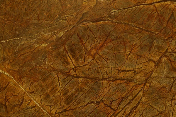人工照明の下で撮影された内部のクラッディングに適した色のテクスチャ大理石 — ストック写真