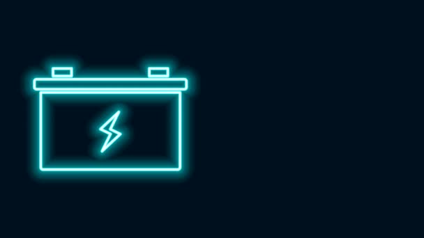 Žhnoucí neonová čára Baterie ikona izolované na černém pozadí. Akumulátorová akumulátorová baterie a akumulátorová baterie. Grafická animace pohybu videa 4K — Stock video