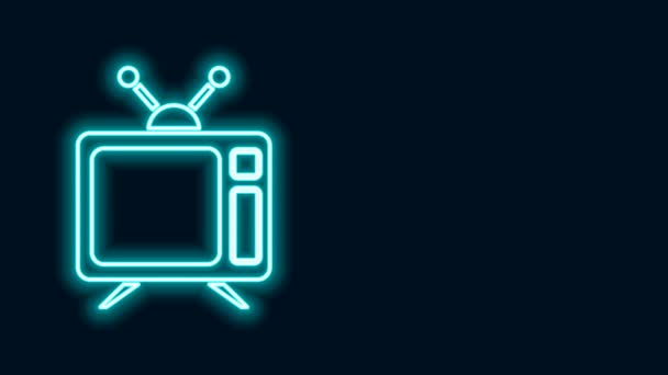 Gloeiende neon lijn Tv pictogram geïsoleerd op zwarte achtergrond. Televisieteken. 4K Video motion grafische animatie — Stockvideo