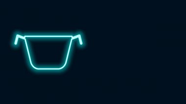 Parlayan neon hattı siyah arka planda izole edilmiş tencere pişirme ikonu. Haşlama ya da güveç besin sembolü. 4K Video hareketli grafik canlandırması