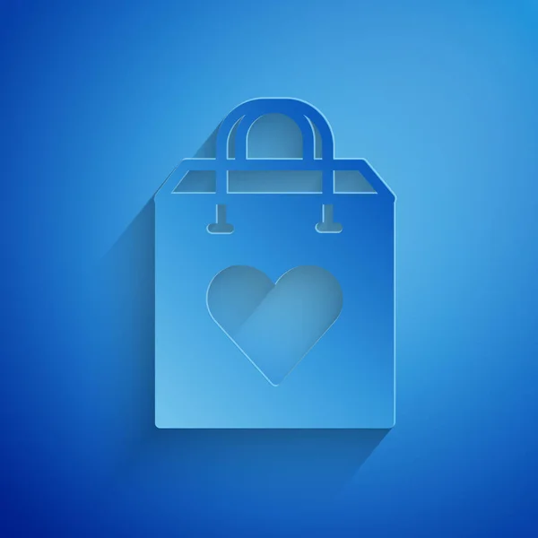 Χαρτοκομμένη Τσάντα Αγορών Εικονίδιο Καρδιάς Που Απομονώνεται Μπλε Φόντο Ψώνια — Διανυσματικό Αρχείο