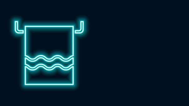 Gloeiende neon lijn Handdoek op een hanger pictogram geïsoleerd op zwarte achtergrond. Badkamer handdoek pictogram. 4K Video motion grafische animatie — Stockvideo