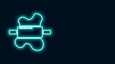 Parlak neon çizgisi, siyah arkaplanda izole edilmiş hamur simgesinde yuvarlanan iğne. 4K Video hareketli grafik canlandırması
