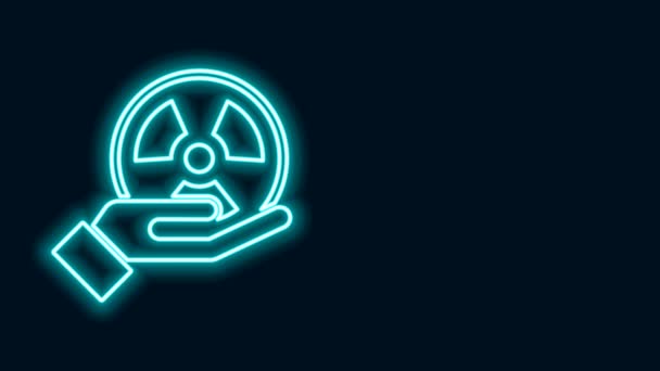 Glowing neon line Radioactive in hand icon isolated on black background. Radioactive toxic symbol. Radiation Hazard sign. 4K Video motion graphic animation — Stock Video