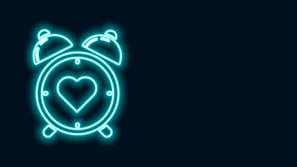 Glowing neon line Heart in the center alarm clock icon isolated on black background. Valentines day. 4K Video motion graphic animation — Stock Video