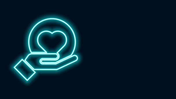 Zářící neonová čára Ikona Srdce na dlani izolovaná na černém pozadí. Ruka dává milostný symbol. Grafická animace pohybu videa 4K — Stock video