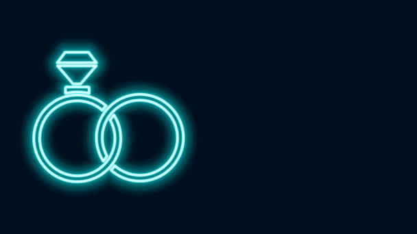 Linea neon incandescente Icona ad anelli nuziali isolata su sfondo nero. Sposa e sposo segno gioielli. Simbolo del matrimonio. Anello di diamanti. Animazione grafica 4K Video motion — Video Stock