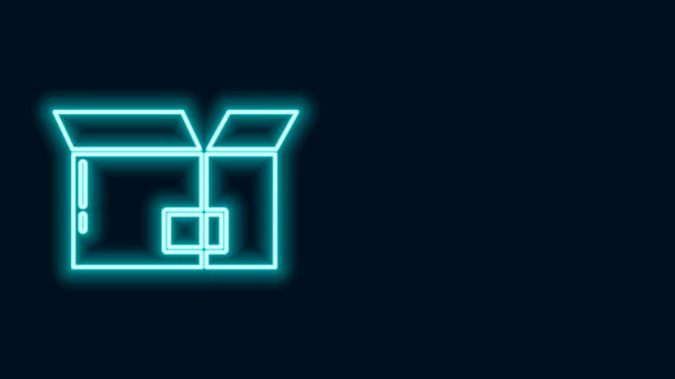 Świecąca neonowa linia Tekturowa ikona pudełka kartonowego izolowana na czarnym tle. Pudełko, paczka, znak paczki. Dostawa i pakowanie. 4K Animacja graficzna ruchu wideo — Wideo stockowe