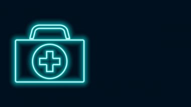 Parlayan neon hattı ilk yardım çantası simgesi siyah arkaplanda izole edildi. Haçlı sağlık kutusu. Acil durumlar için tıbbi ekipman. Sağlık sigortası konsepti. 4K Video hareketli grafik canlandırması