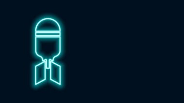 Parlayan neon hattı bomba ikonu siyah arka planda izole edildi. Roket bombası düşüyor. 4K Video hareketli grafik canlandırması