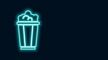 Siyah arka planda izole edilmiş karton kutuda parlayan neon çizgi patlamış mısır. Patlamış mısır kutusu. 4K Video hareketli grafik canlandırması