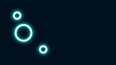 Parlayan neon hattı güneş sistemi simgesi siyah arkaplanda izole edildi. Gezegenler yıldızın etrafında dönerler. 4K Video hareketli grafik canlandırması