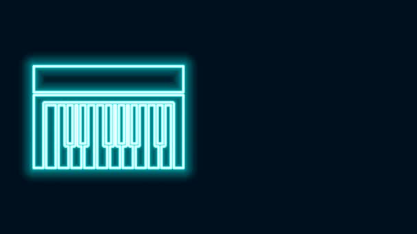 Zářící neonová čára Ikona syntezátoru hudby izolovaná na černém pozadí. Elektronické piano. Grafická animace pohybu videa 4K — Stock video