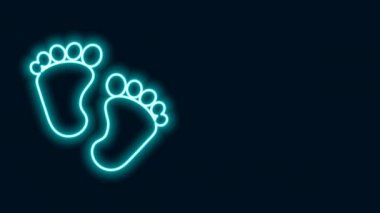 Parlayan neon çizgisi Bebek ayak izi simgesi siyah arkaplanda izole edildi. Bebek ayağı işareti. 4K Video hareketli grafik canlandırması