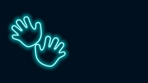 Glowing neon line Baby hands print icon isolated on black background. Animasi grafis gerak Video 4K — Stok Video