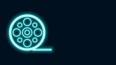 Parlayan neon hattı film makarası simgesi siyah arkaplanda izole edildi. 4K Video hareketli grafik canlandırması