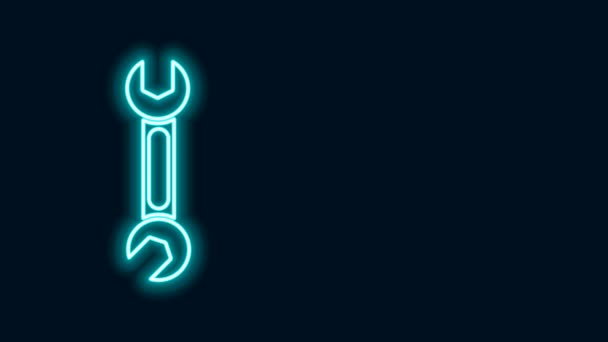 Glowing neon line Wrench icon isolated on black background. Spanner icon. 4K Video motion graphic animation — Stock Video