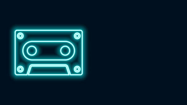 Glowing neon line Retro audio cassette tape icon isolated on black background. 4K Video motion graphic animation — Stock Video