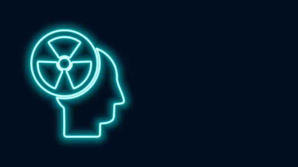 ネオンラインの輝き人間の頭のシルエットと黒の背景に隔離された放射線のシンボルアイコン。4Kビデオモーショングラフィックアニメーション — ストック動画