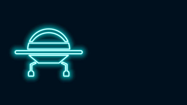 Świecąca neonowa ikona UFO latającego statku kosmicznego odizolowana na czarnym tle. Latający spodek. Kosmiczny statek kosmiczny. Futurystyczny, nieznany obiekt latający. 4K Animacja graficzna ruchu wideo — Wideo stockowe