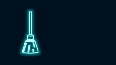 Parlayan neon hattı cadı süpürgesi simgesi siyah arka planda izole edildi. Mutlu Cadılar Bayramı Partisi. 4K Video hareketli grafik canlandırması