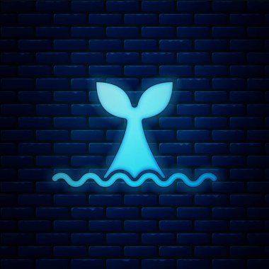 Okyanus dalgası ikonunda parlayan neon balina kuyruğu tuğla duvar arkasında izole edilmiş. Vektör.