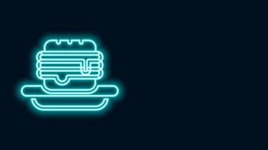 Parlayan neon hattı siyah arkaplanda izole edilmiş Junk yiyecek simgesi. Yasak sosisli sandviç. Fast food işareti yok. 4K Video hareketli grafik canlandırması